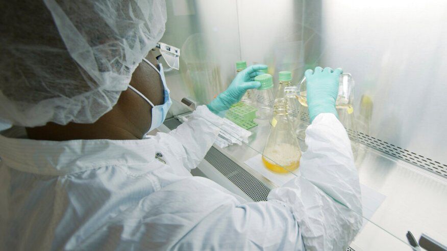 A researcher tests possible COVID-19 antibodies in a laboratory in Indianapolis